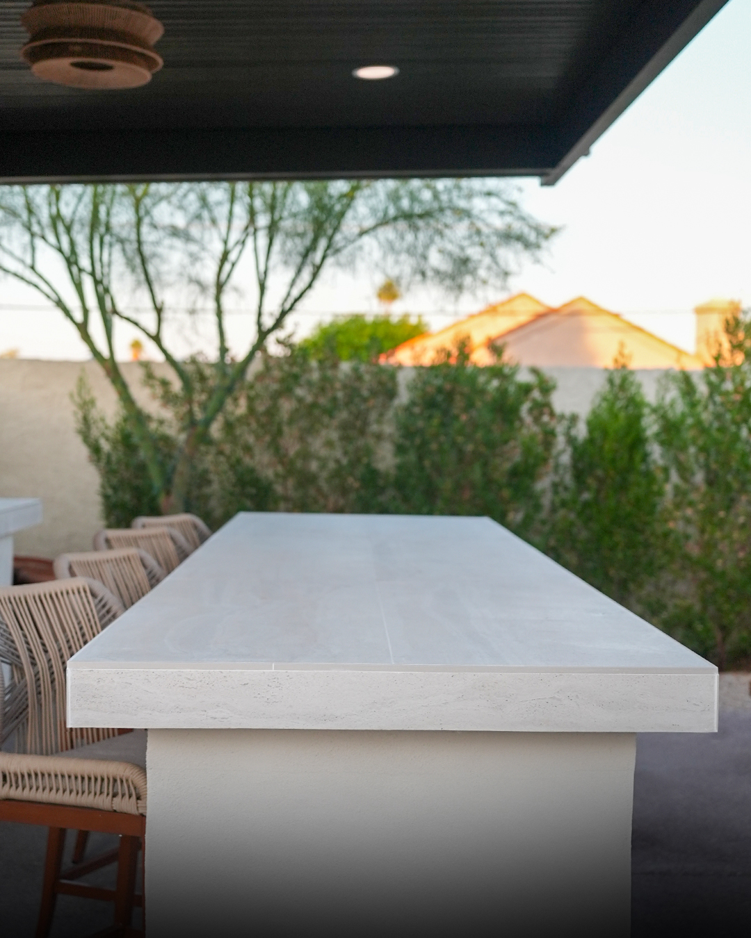 Close-up of a thick stone outdoor bar countertop edge